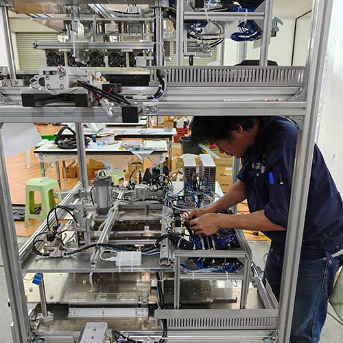 Wiring work for machine control systems and machine control programming.